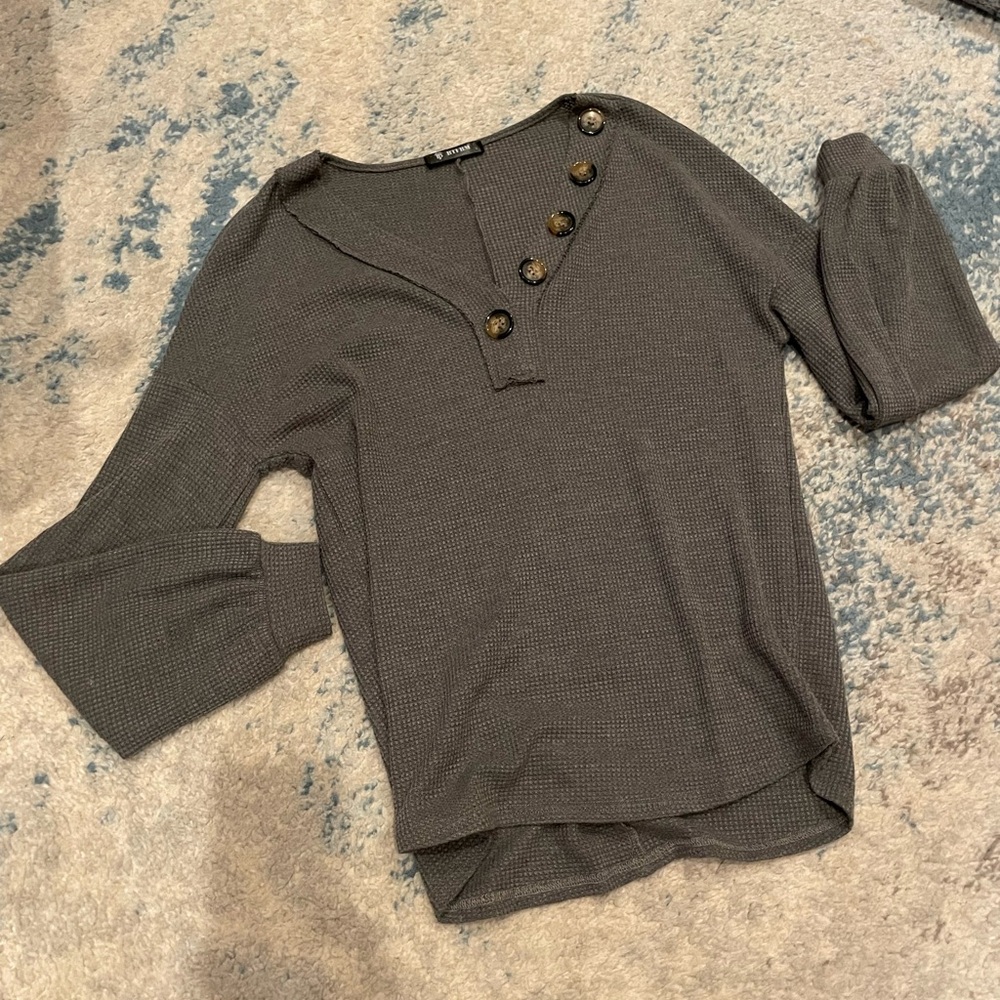 grey long sleeve with buttons on v neck

size SMALL